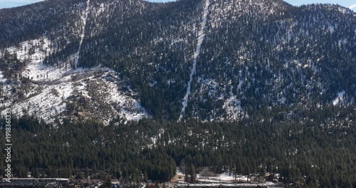 South Lake Tahoe, CA, USA - 02-15-2026  Aerial video of South Lake Tahoe, California and Stateline, Nevada on a winter afternoon.  
