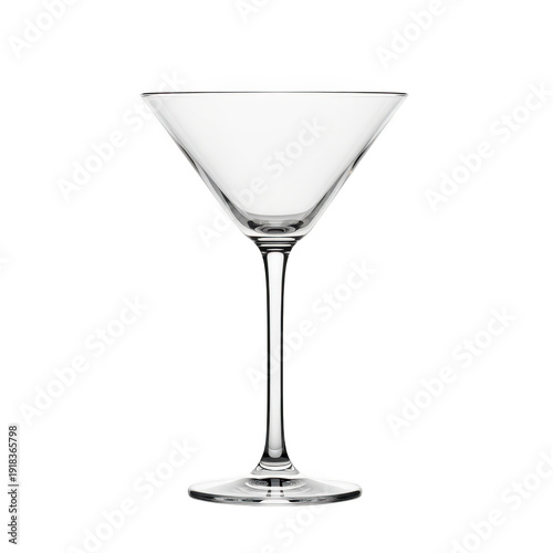 A clear martini glass on a white background