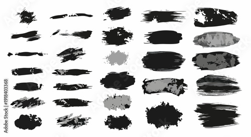 Ensemble d'éclaboussures et de coups de pinceau noirs et gris sur fond blanc, texture abstraite