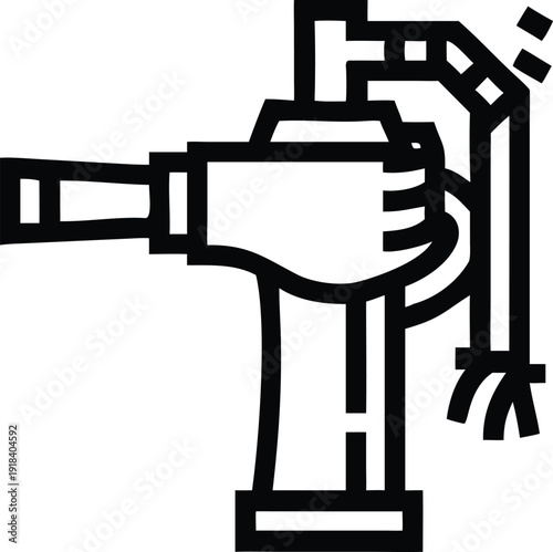 Human hand operating an industrial tool representing construction work or manufacturing processes