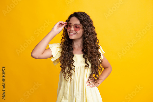 Happy teenager, positive and smiling emotions of teen girl. Beautiful teen girl student. Portrait of teenager school girl on isolated background. Clever schoolgirl, nerd smart child.