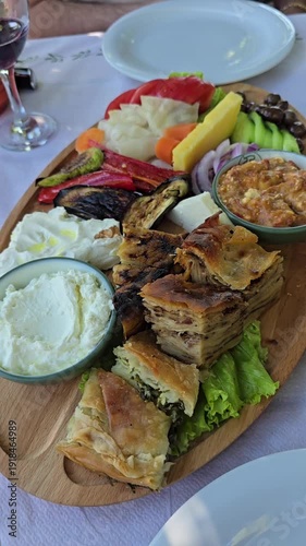 antipasti with traditional Albanian foods such as pie, various cheeses, etc.