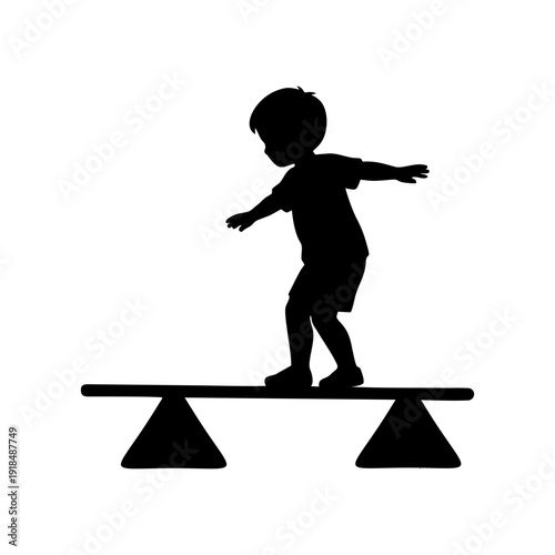 silhouette of a child playing on a balance beam