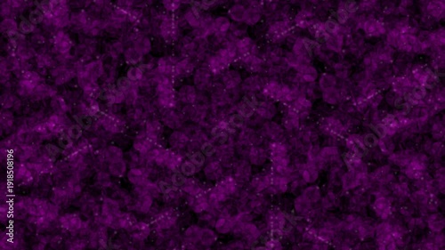 Close-up of sparkling purple light particles and bokeh effect