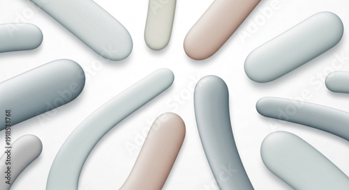 Soft pastel colored rounded shapes arranged in a circular pattern on white background abstract design elements