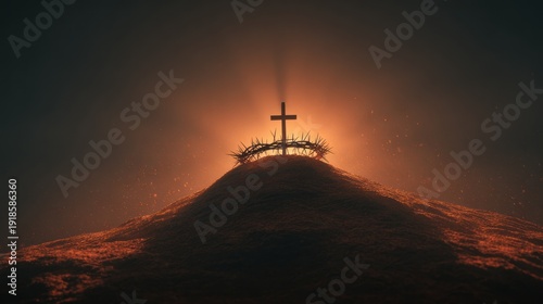 A cross with a crown of thorns on a hill with a dark, moody sky in the background.
