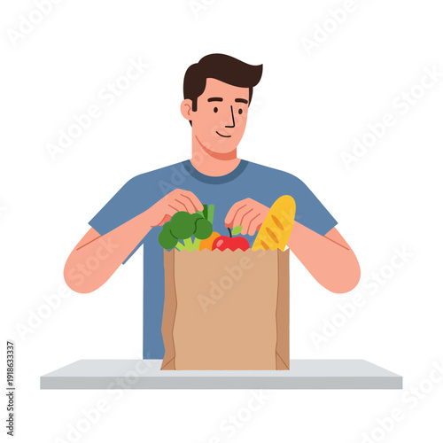 Man packing groceries into bag during Ramadhan