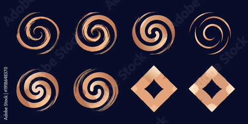 Abstract golden swirls and diamond shapes arranged on a dark background