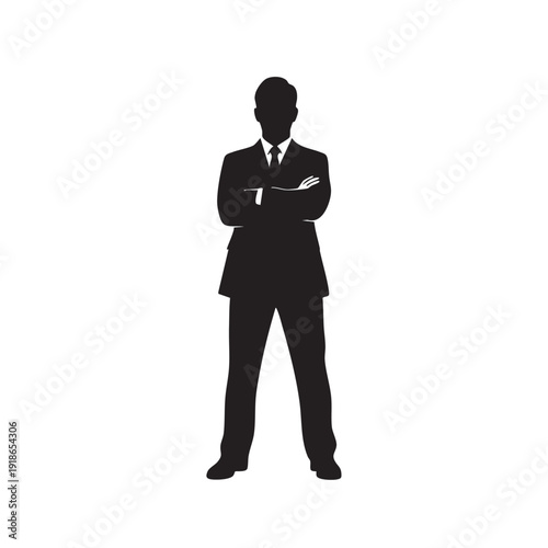 Silhouette of a single businessman standing with arms crossed showing confidence and authority in a professional setting