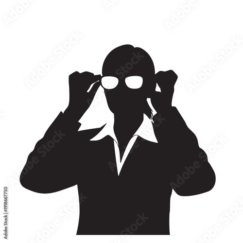Silhouette of person adjusting eyeglasses, focused and thoughtful, in business attire, representing vision, clarity, and intellectual work in professional setting.