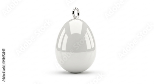 White egg shaped pendant with reflective surface and silver loop on plain white background