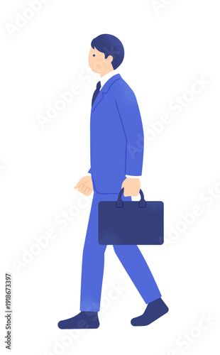 クライアントへ訪問する男性。鞄を持ってアクティブに歩くスーツ姿の営業マン。