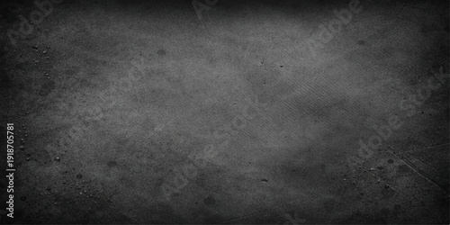 A dark vintage grunge background featuring a textured black stone wall and rough gray concrete surface with a dirty paper pattern for a blank weathered backdrop design