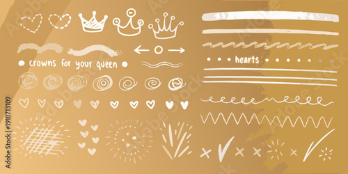 Golden hand drawn doodles of crowns hearts and decorative elements