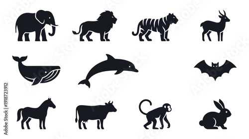 Collection of blue wildlife silhouettes featuring elephant, rhinoceros, tiger, antelope, swan, dolphin, bat, horse, ram, goat and rabbit in vector style