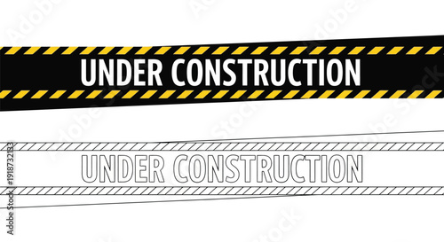 Black and white under construction warning signs with yellow stripes