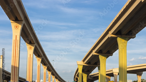 Fotografie Elevated highway bridge infrastructure in Texas sky