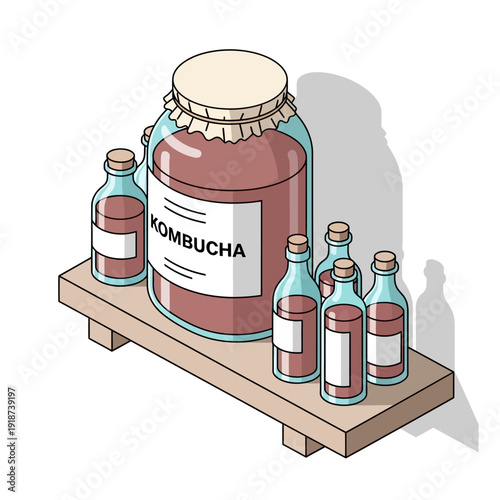 Kombucha bottles and large jar on a wooden table.