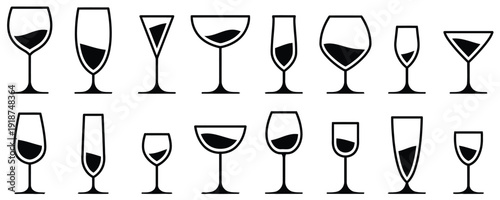 Assortment of wine and cocktail glasses filled with liquid for beverage and celebration themes