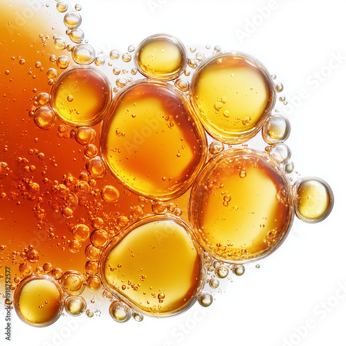 orange liquid oil bubbles on white background