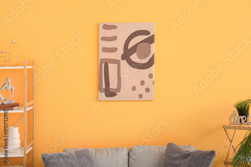 Picture on yellow wall in l...