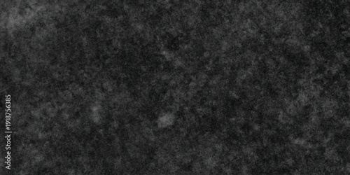 Dark charcoal grunge wall texture background. Dark black rough grunge surface with smoke edge. Black texture chalk board and black board.