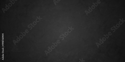 Dark charcoal grunge wall texture background. Dark black rough grunge surface with smoke edge. Black texture chalk board and black board.