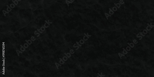 Dark charcoal grunge wall texture background. Dark black rough grunge surface with smoke edge. Black texture chalk board and black board.