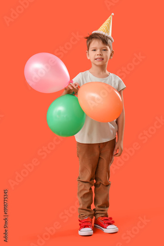 Cute little boy with party ...