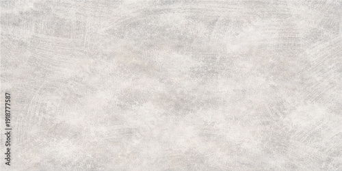 A vintage grunge paper background features a rough grey stone surface texture with a faded marble pattern and cold winter ice design on a blank weathered material