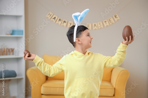 Cute little boy in bunny ea...