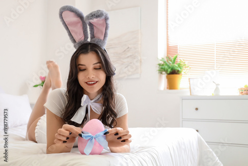 Sexy young woman in bunny c...