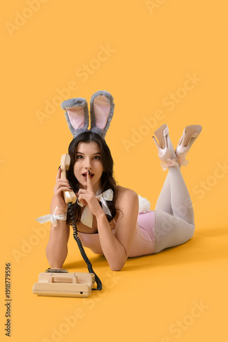 Sexy young woman in bunny c...