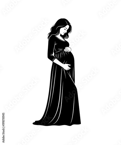 Pregnant woman in elegant black maternity gown holding baby bump outdoors
