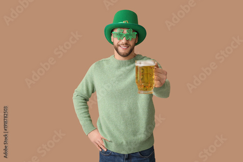Young man in leprechaun hat...