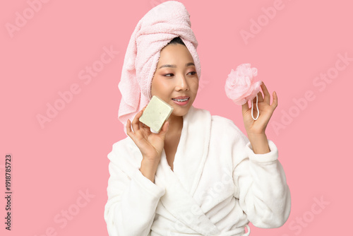 Young Asian woman with soap...
