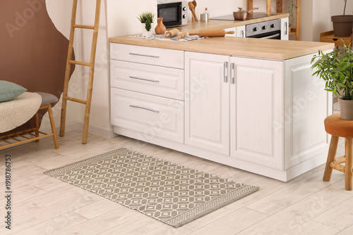 Interior of light kitchen w...