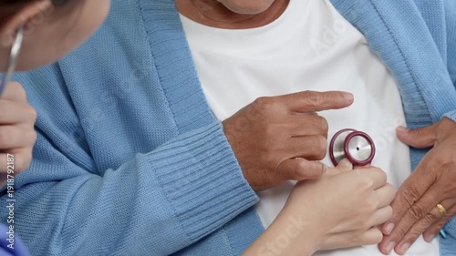 Female, nurse and tablet with senior patient for living assistance or healthcare in retirement home. Female, caregiver and listening to client with technology for elderly care in old age house.
