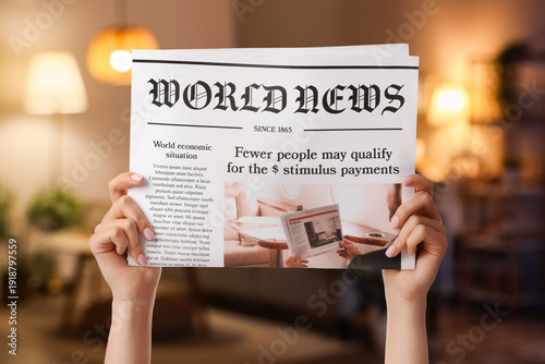 Female hands and newspaper ...