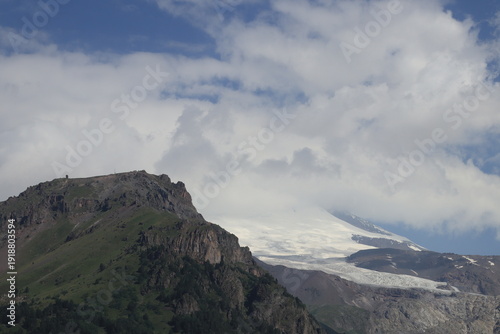 Canvas Print Mount Elbrus in clouds and fog on a summer day