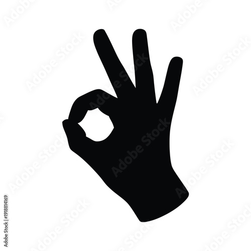 A silhouetted hand displaying the ok gesture with fingers and thumb