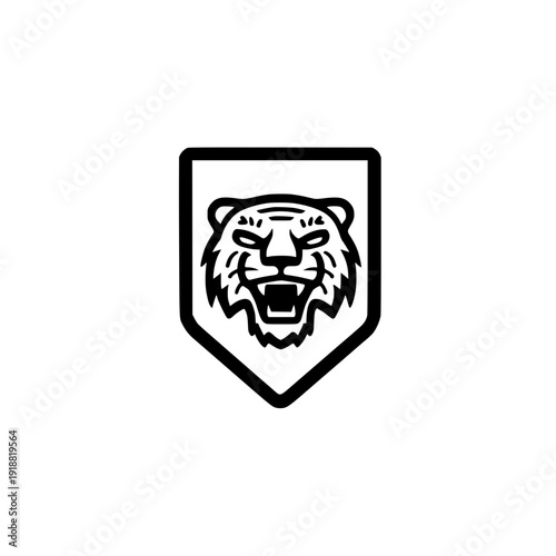 Emblematic shield carrying tiger head as a mark of resilience and guardianship