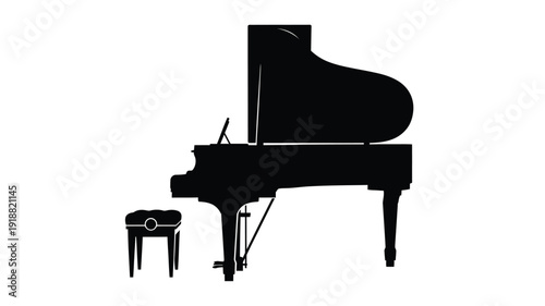 Elegant grand piano and stool in stark contrast a dramatic silhouette