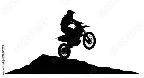 Motorcyclist Jumping on Dirt Bike.