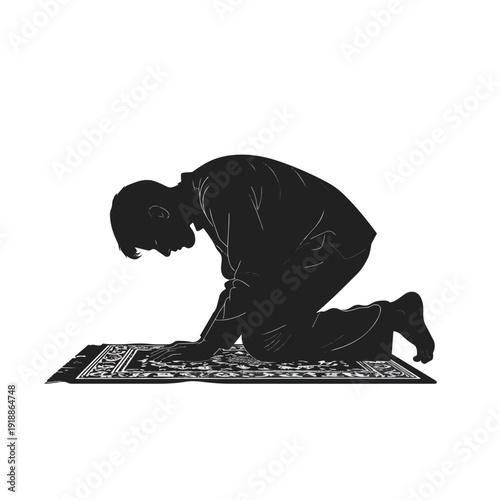 Tableau sur toile Contemplation and Devotion: A silhouette of a person in a prayerful posture, reflecting the stillness of spiritual reverence and devotion