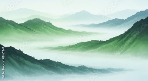 Misty green mountains receding into atmospheric haze