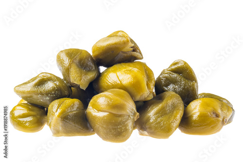 Pickled glossy green capers isolated