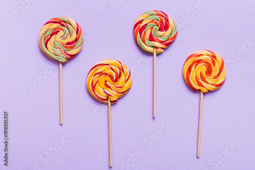 Wallpaper Mural Set of colorful lollipops on colored background. Summer concept. Party Happy Birthday or Minimalist Concept Torontodigital.ca