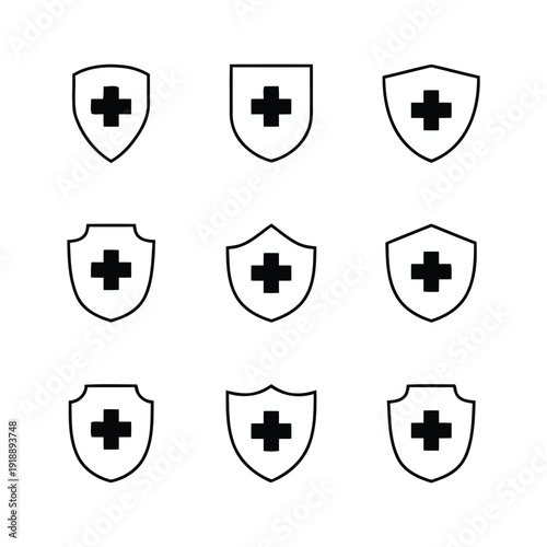 Collection of shield icons with medical cross symbols inside for healthcare and protection concepts
