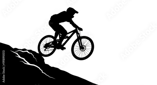 Mountain Biker Riding Downhill Silhouette.